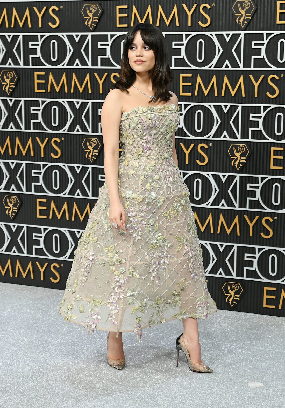 Jenna Ortega's 2024 Emmys Look Featured A SeeThrough Cage Dress