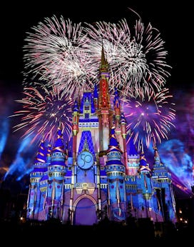 Fireworks illuminate Cinderella Castle at the Magic Kingdom marking the 50th anniversary of Walt Dis...