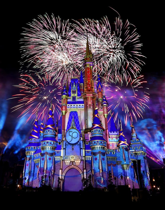Fireworks illuminate Cinderella Castle at the Magic Kingdom marking the 50th anniversary of Walt Dis...