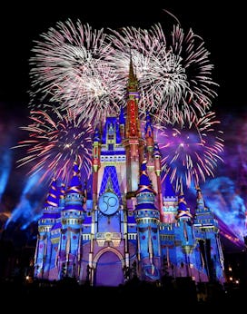 Fireworks illuminate Cinderella Castle at the Magic Kingdom marking the 50th anniversary of Walt Dis...