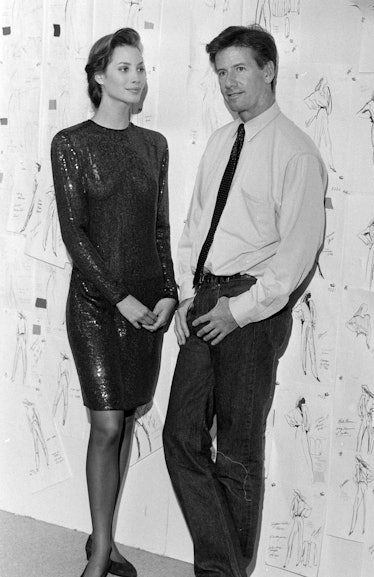 Designer Calvin Klein poses with model Christy Turlington inside of Klein's New York City design stu...