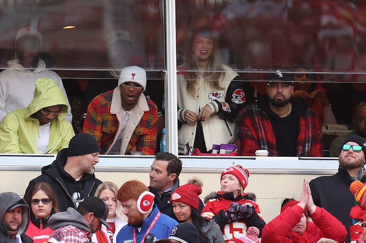 Taylor Swift watches the game between the Cincinnati Bengals and the Kansas City Chiefs on New Year'...