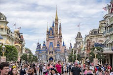 A mom is trying to get excited about her first time to disney with four kids.
