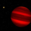 Artist's concept of how the brown dwarf Gliese 229 b might appear from a distance of about a half mi...