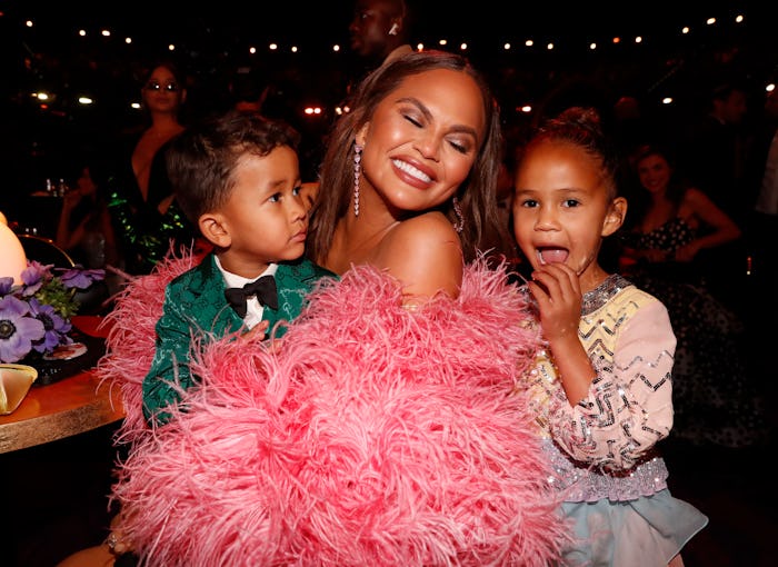 LAS VEGAS, NEVADA - APRIL 03: (L-R) Miles Stephens, Chrissy Teigen, and Luna Stephens attend the 64t...