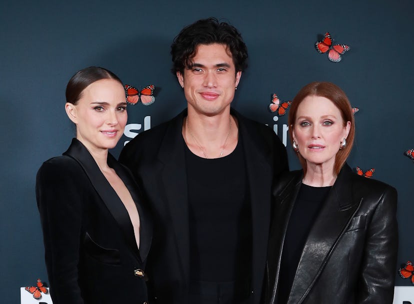 LONDON, ENGLAND - DECEMBER 06: (L-R) Natalie Portman, Charles Melton and Julianne Moore pose for a p…