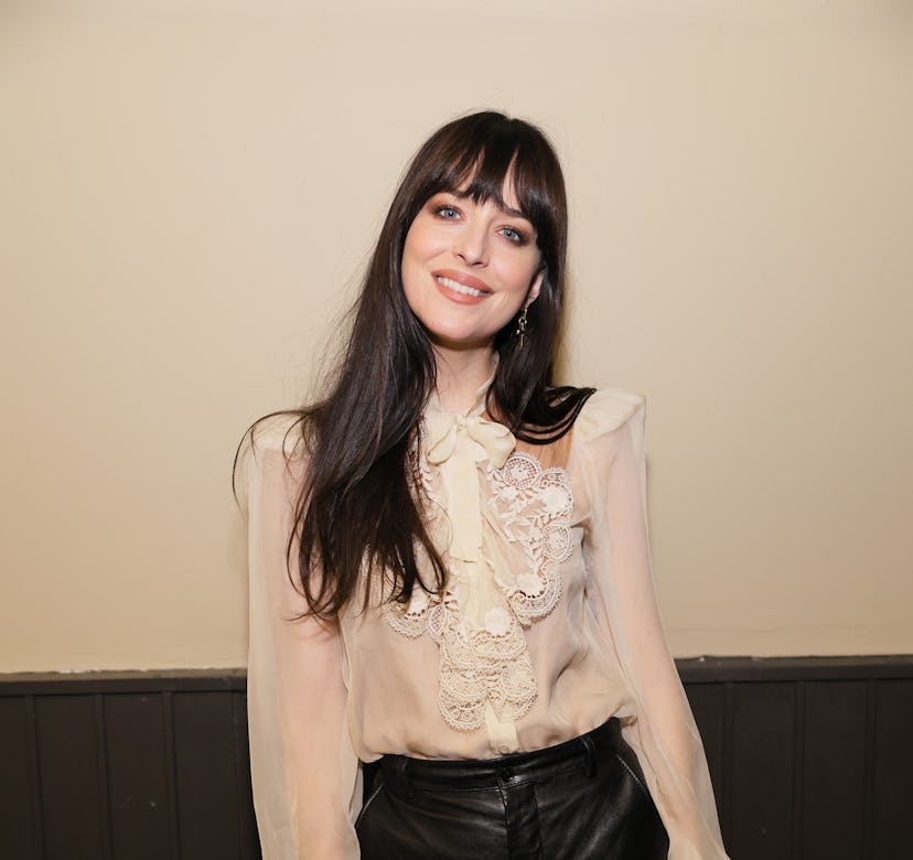 Dakota Johnson ruffle front gucci shirt