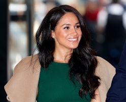 Meghan Markle curled hair and camel coat