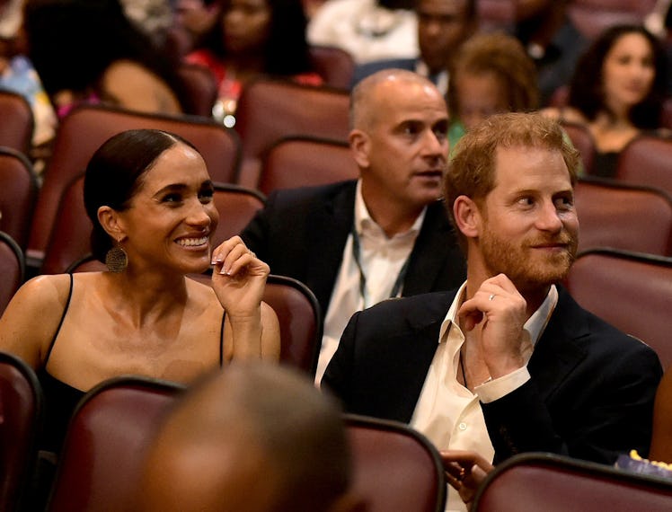 KINGSTON, JAMAICA - JANUARY 23: (L-R) Meghan, Duchess of Sussex and Prince Harry, Duke of Sussex att...