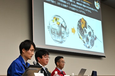 Daichi Hirnao (L), associate senior researcher at JAXA's Space Exploration Innovation Hub Center, ex...