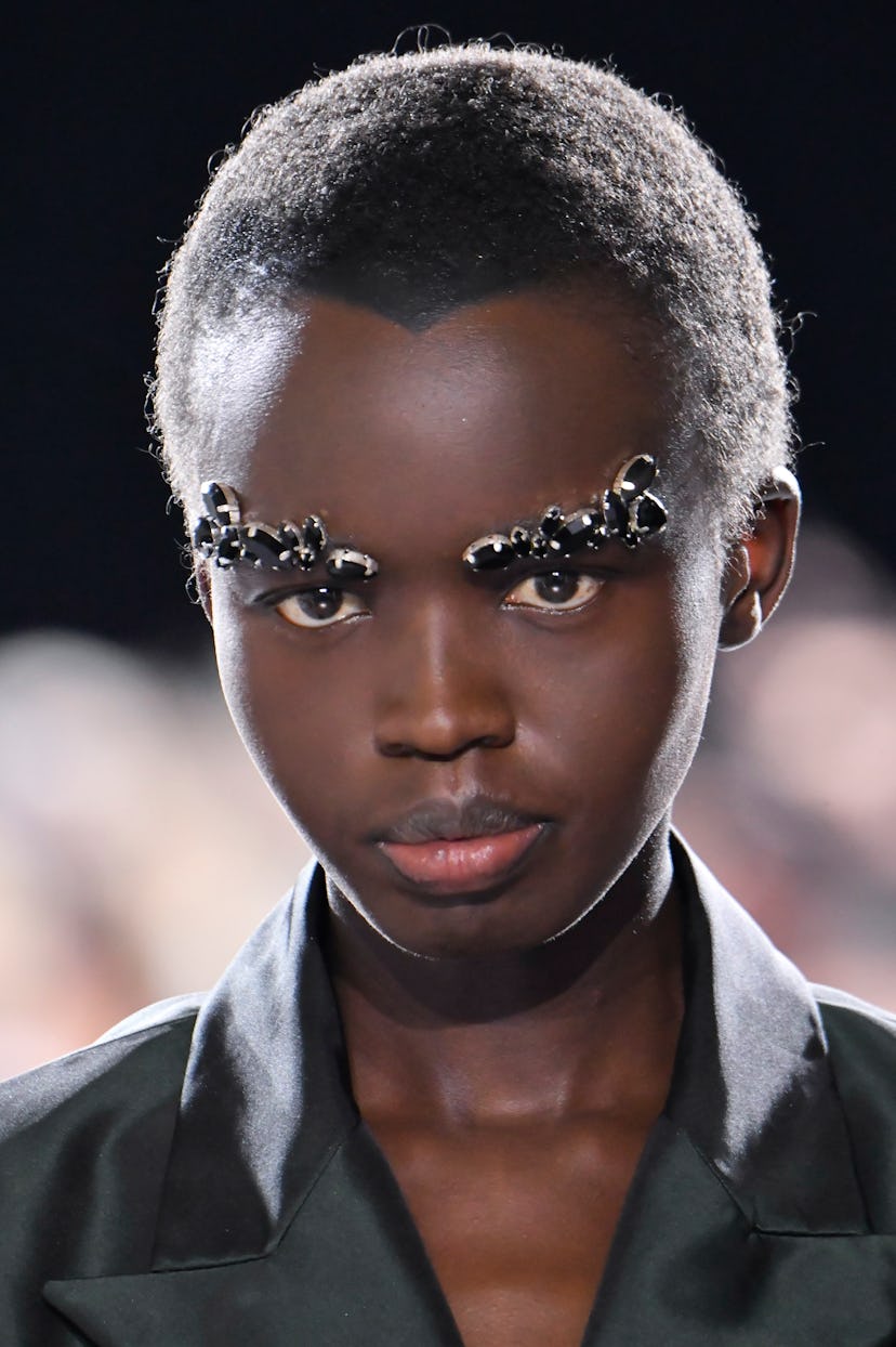 Oversized brow gems were spotted on the Jean Paul Gaultier Haute Couture runway.