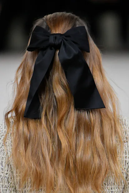 An oversized black ribbon was spotted on the Chanel Haute Couture runway.