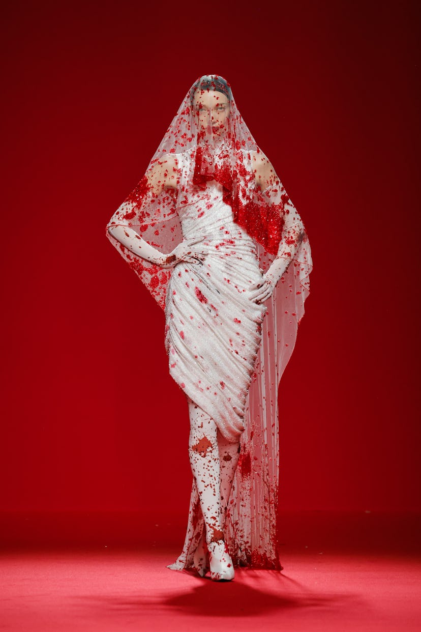 A model walks the runway during the Robert Wun Haute Couture Spring/Summer 2024 show at Palais de To…