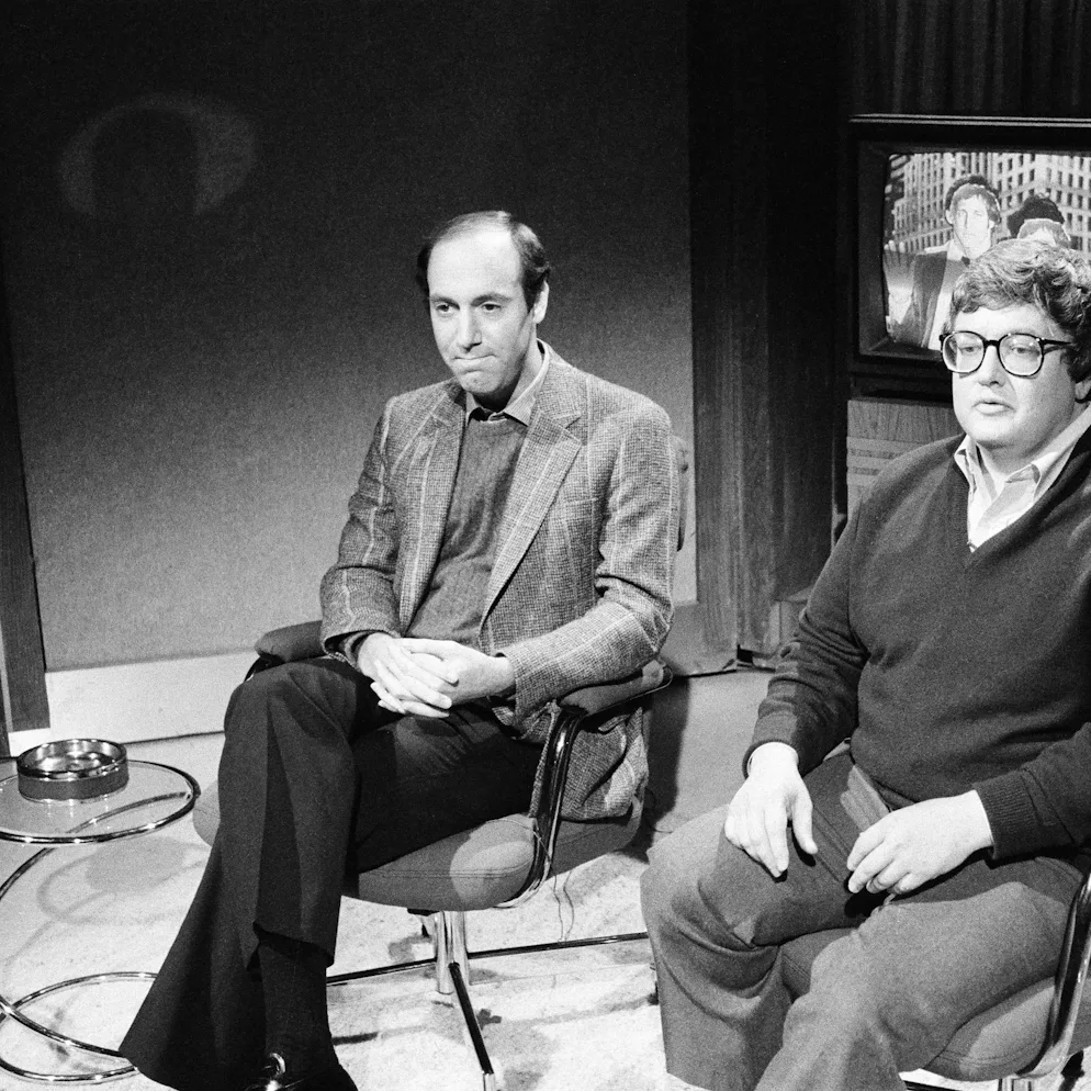 SATURDAY NIGHT LIVE -- Episode 1 -- Pictured: (l-r) Gene Siskel, Roger Ebert during the 'Review' ski...