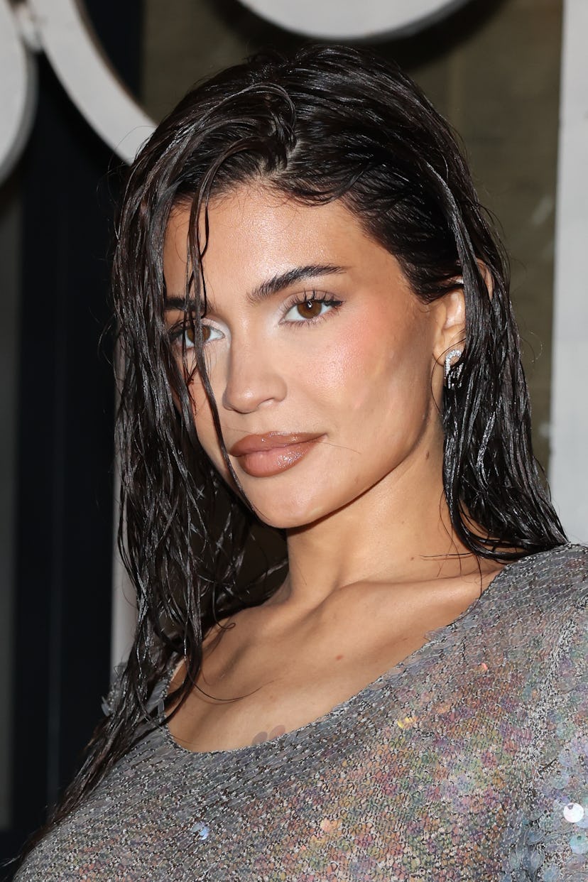 Kylie Jenner rocks the wet hair look at Maison Margiela Haute Couture Spring/Summer 2024 show as par...