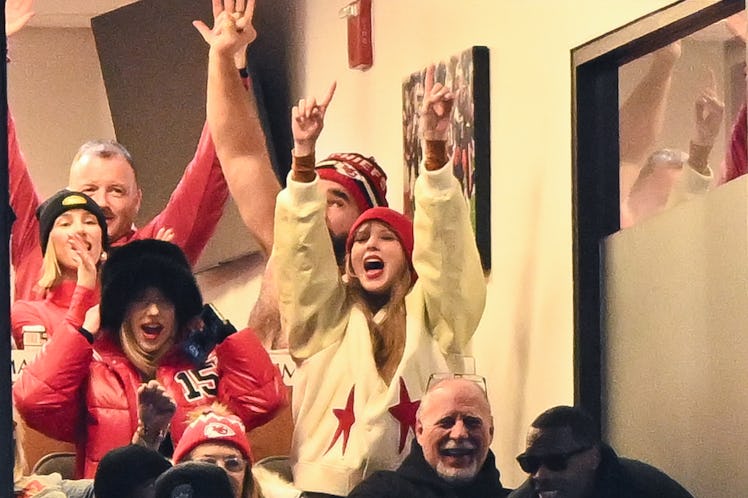 Taylor Swift in the VIP suite at the Kansas City Chiefs and Buffalo Bills game, wearing a white vars...