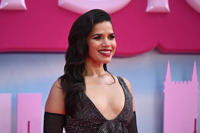 US actress America Ferrera poses on the pink carpet upon arrival for the European premiere of "Barbi...