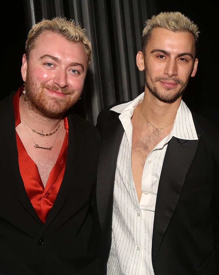 Sam Smith and partner Christian Cowan pose backstage at the hit musical "Some Like it Hot" on Broadw...