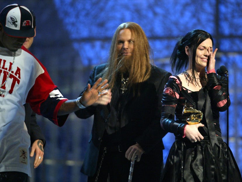 LOS ANGELES, UNITED STATES:  Evanescence accepts their Grammy for Best New Artist as performer 50 Ce...
