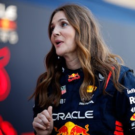 AUSTIN, TEXAS - OCTOBER 19: Drew Barrymore wears Oracle Red Bull Racing team overalls in the Paddock...