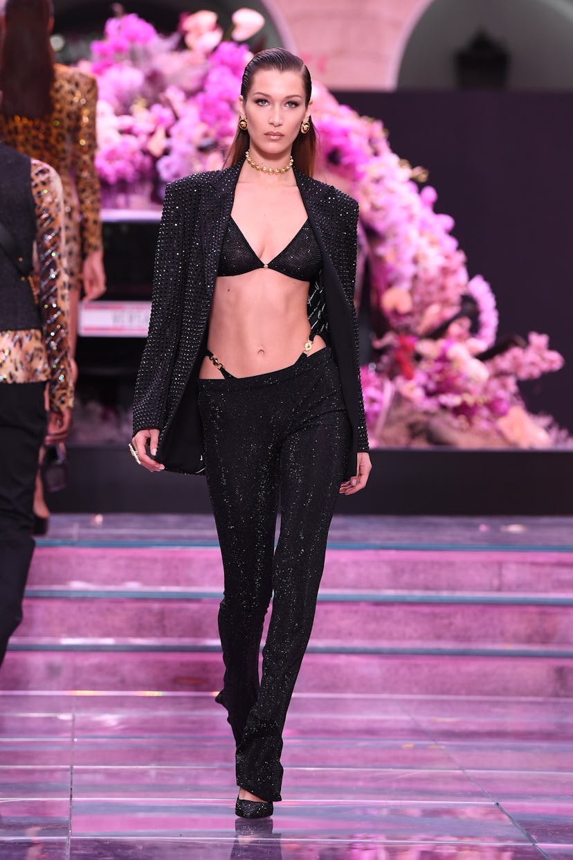 Bella Hadid walks the runway at the Versace fashion show during the Milan Men's Fashion Week Spring/...