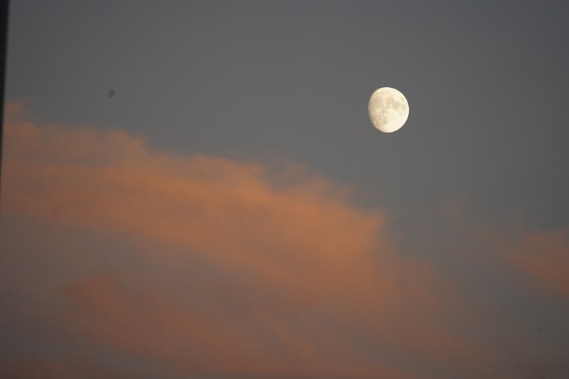 Moon with sunset sky, detail of cloud with the last rays of the Sun