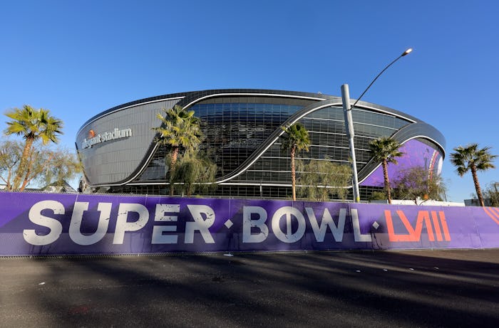 LAS VEGAS, NEVADA - JANUARY 30: An exterior view shows signage for Super Bowl LVIII on fencing aroun...
