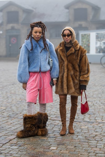 COPENHAGEN, DENMARK - JANUARY 30: Fia Hamelijnck wears blue jacket, pink pants, fur boots & Amaka Ha...