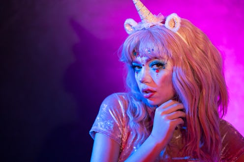 Portrait of a Girl in a beautiful Unicorn Halloween costume.