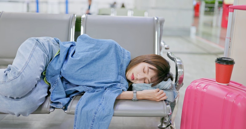 Close up asian female sleeping on the seat at the airport