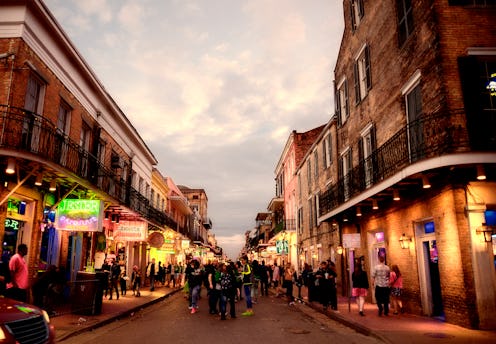 Mardi Gras in Bourbon Street French Quarter New Orleans Louisiana. Toned Image.