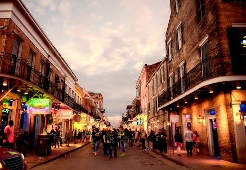 Mardi Gras in Bourbon Street French Quarter New Orleans Louisiana. Toned Image.