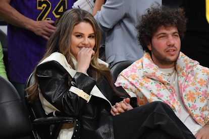 LOS ANGELES, CALIFORNIA - JANUARY 03: Selena Gomez and Benny Blanco attend a basketball game between...