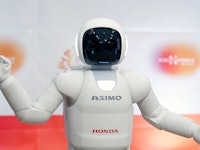 ST QUENTIN, FRANCE - NOVEMBER 25:  Honda Motors demonstrates its ASIMO robot during the 'Robonumeriq...