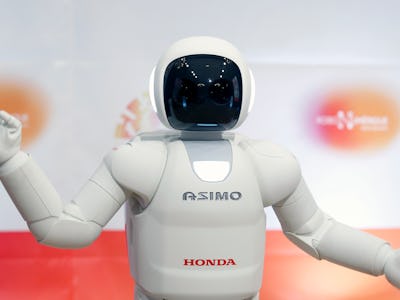 ST QUENTIN, FRANCE - NOVEMBER 25:  Honda Motors demonstrates its ASIMO robot during the 'Robonumeriq...