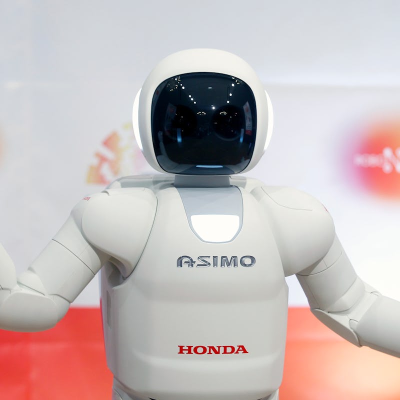 ST QUENTIN, FRANCE - NOVEMBER 25:  Honda Motors demonstrates its ASIMO robot during the 'Robonumeriq...