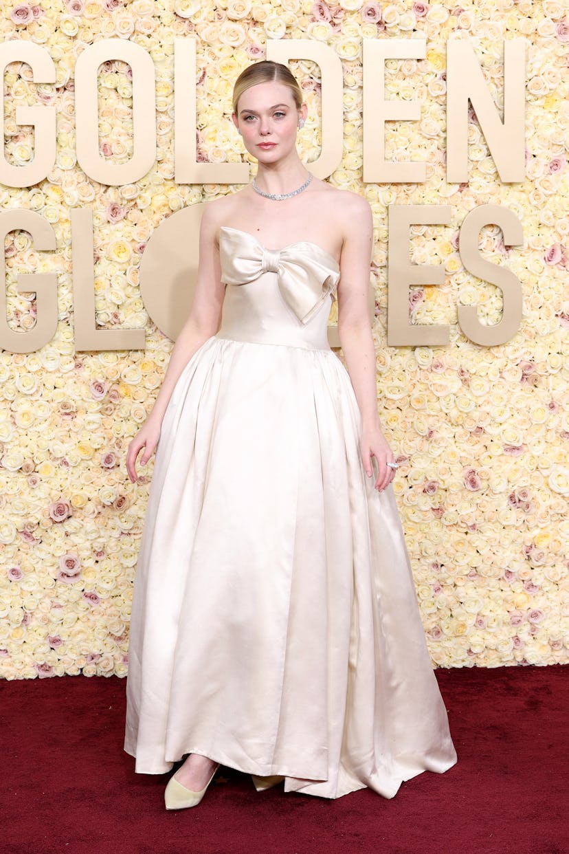 Elle Fanning attends the 81st Annual Golden Globe Awards. 