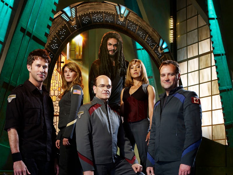 STARGATE ATLANTIS -- Pictured: (l-r) Joe Flanigan as Lt. Col. John Sheppard, Jewel Staite as Dr. Jen...