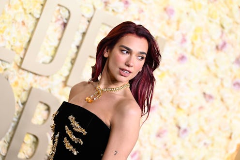 Dua Lipa at the 81st Golden Globe Awards statement necklace