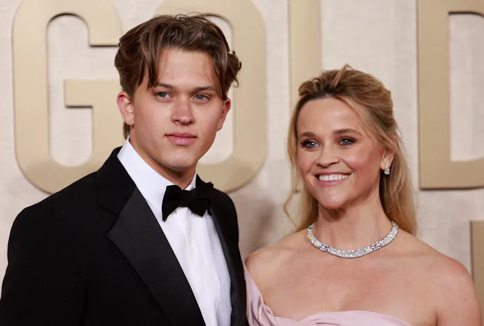 Reese Witherspoon got ready for the Golden Globes with a theme song.
