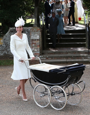 Catherine, Duchess of Cambridge pushes  Princess Charlotte of Cambridge in her pram 