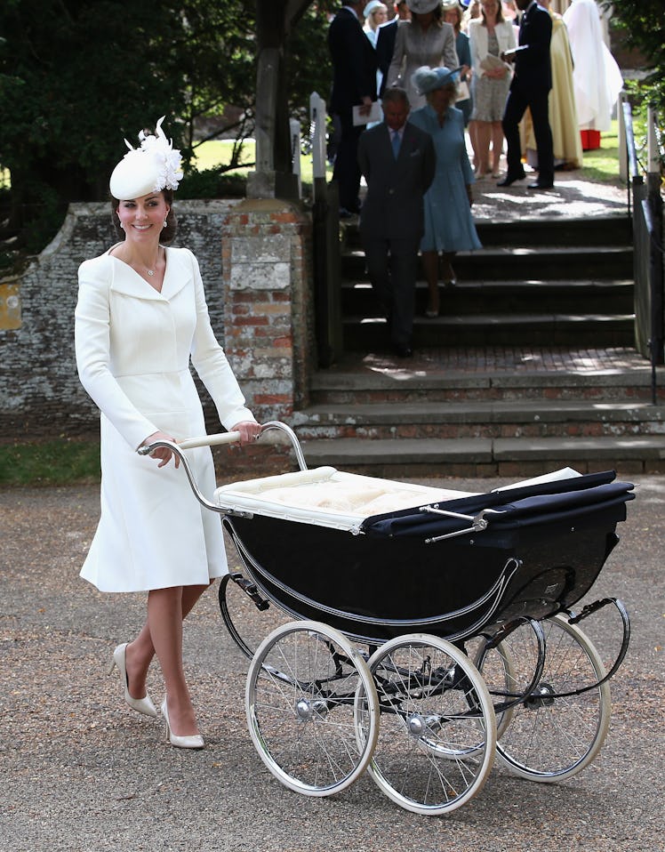Catherine, Duchess of Cambridge pushes  Princess Charlotte of Cambridge in her pram 