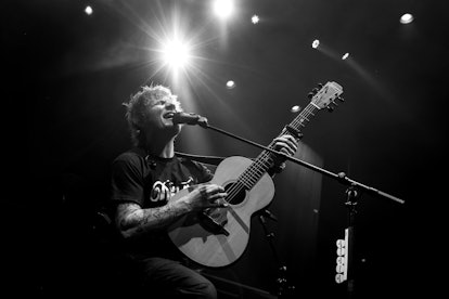 LONDON, ENGLAND - DECEMBER 09: (EDITORS NOTE: Image has been converted to black and white) Ed Sheera...