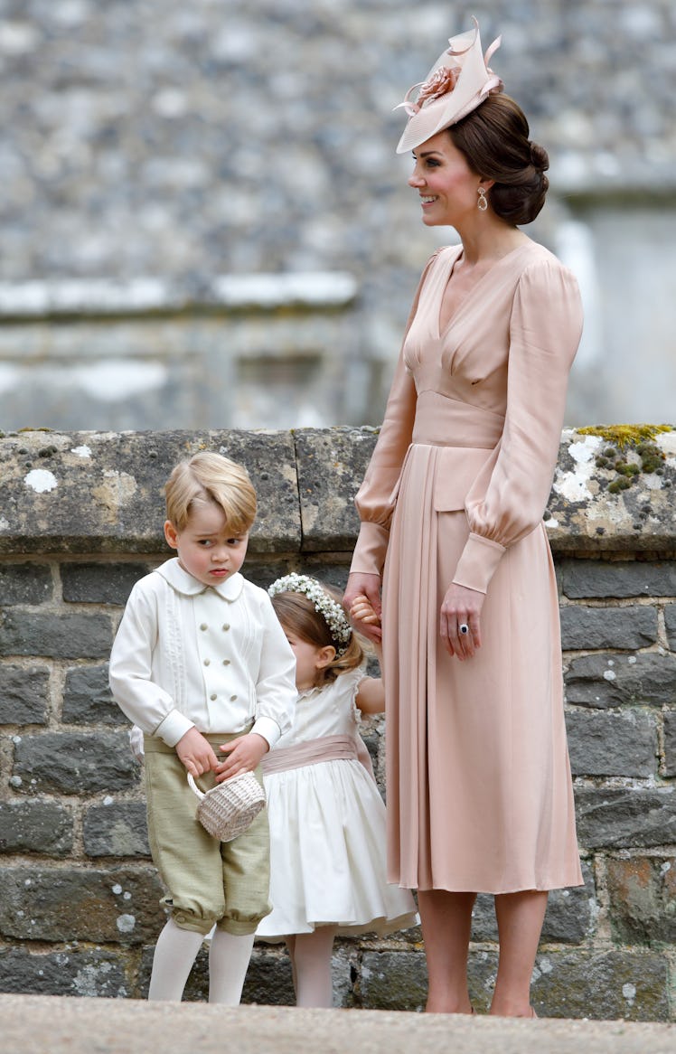 Catherine, Duchess of Cambridge, Prince George of Cambridge and Princess Charlotte of Cambridge atte...