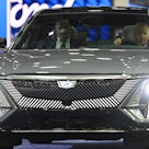 US President Joe Biden sits at the wheel of a Cadillac Lyriq electric vehicle as he visits the 2022 ...