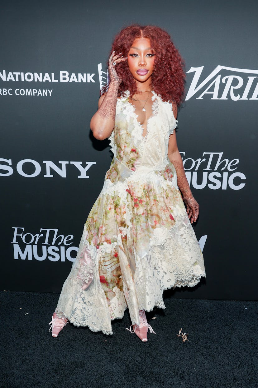 SZA with electric copper hair.