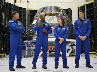 From left to right: Artemis II Astronauts: Commander Reid Wiseman; Pilot Victor Glover; and Mission ...