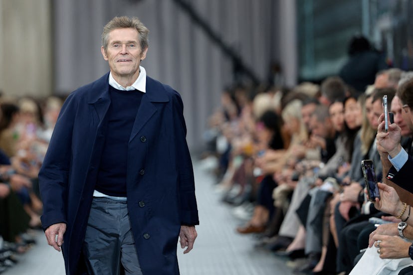 US-born Italian actor Willem Dafoe presents a creation by Miu Miu