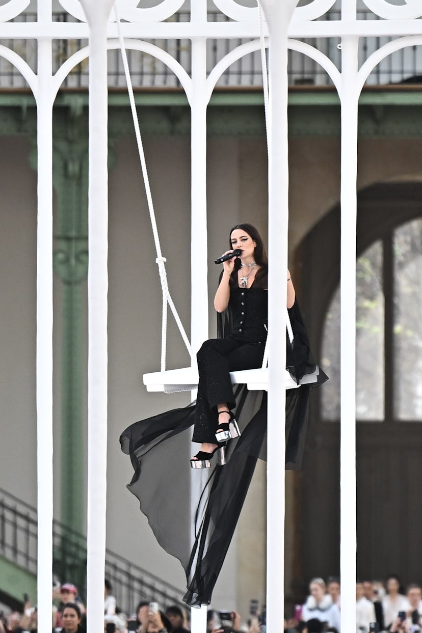 Riley Keough performsl on the runway during the Chanel Paris Womenswear Spring-Summer 2025 show as p...