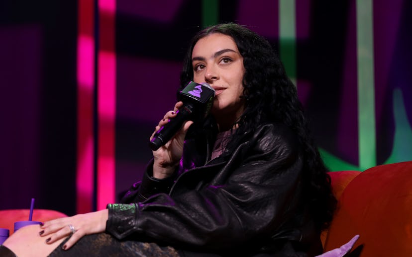 NASHVILLE, TENNESSEE - OCTOBER 01: Charli XCX speaks on stage during the 2024 GRAMMY U Fall Summit o...